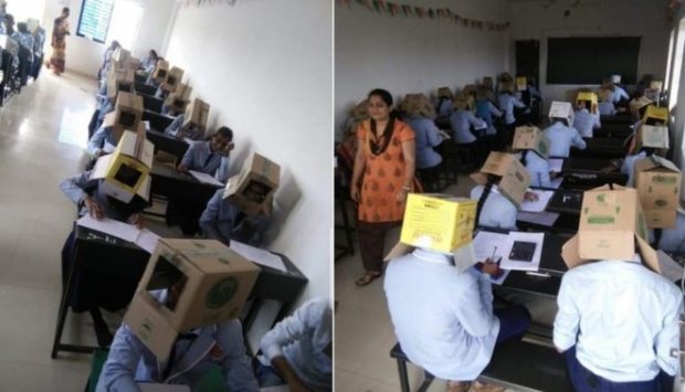 Щоб не списували: студентів в Індії змусили складати іспит з коробками на голові (ФОТО)