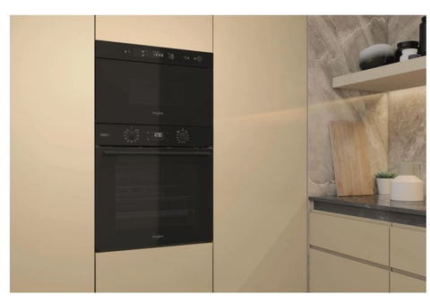 Практичний кухонний помічник у стильному дизайні: 3 популярні моделі вбудованих микрохвильовок